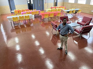 Chris Taylor, assistant director of Opportunity House, a part-time day room, talks Wednesday about his plans for the just-opened facility. (Pine Bluff Commercial/Byron Tate)